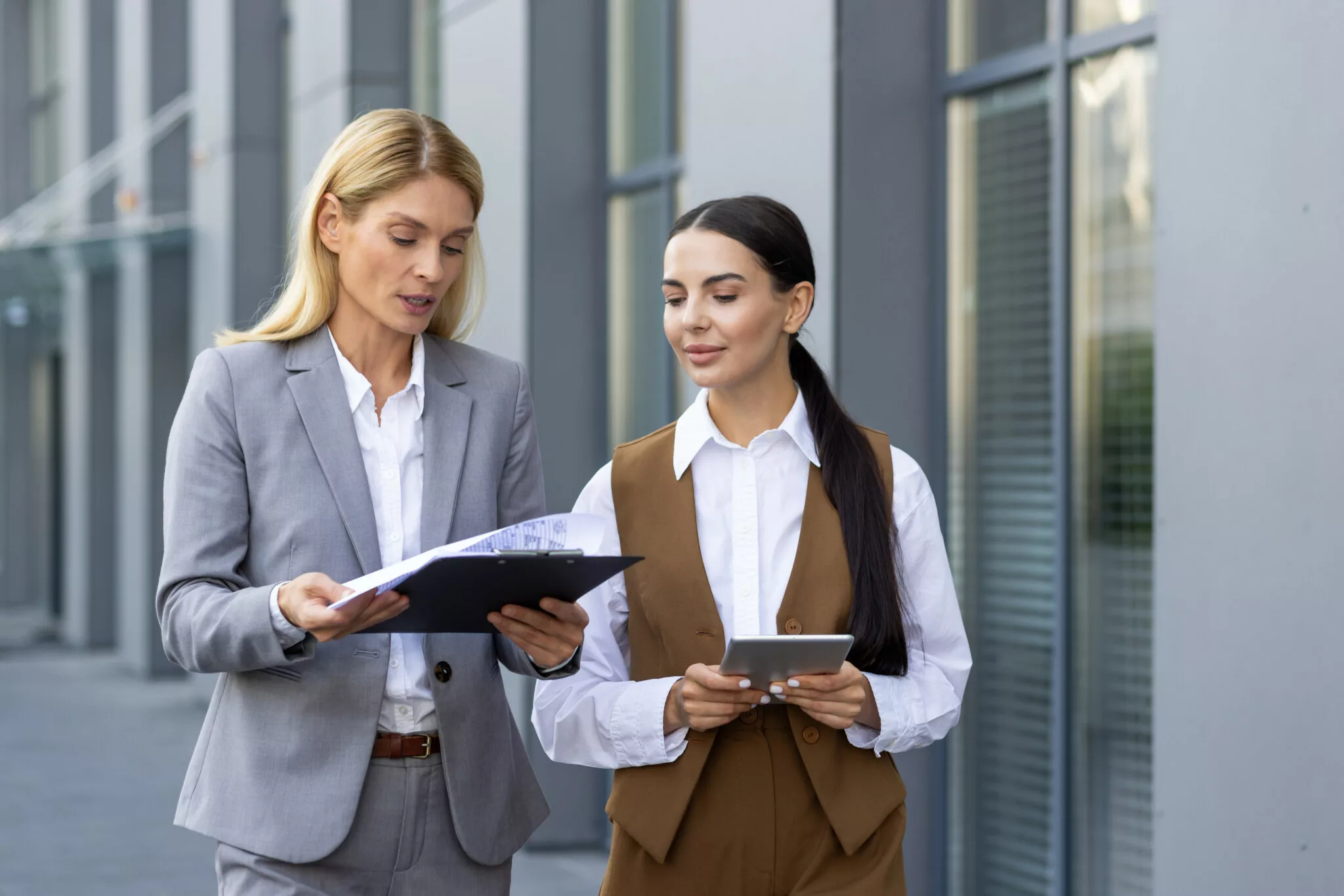 Specialists reviewing client records together